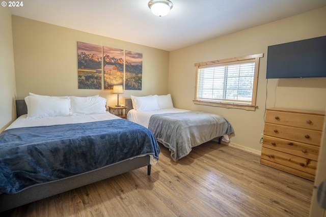 bedroom featuring hardwood / wood-style floors