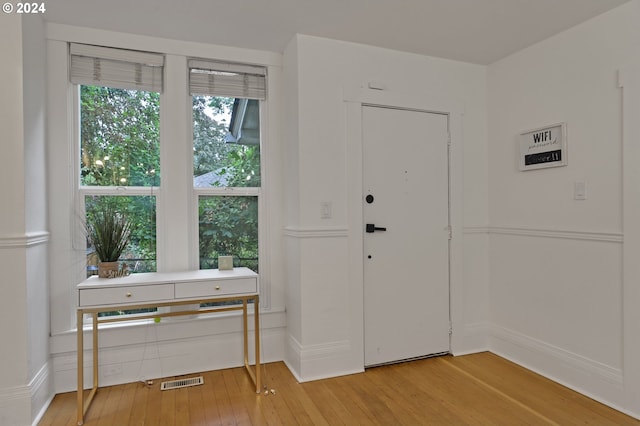 entrance foyer featuring hardwood / wood-style floors