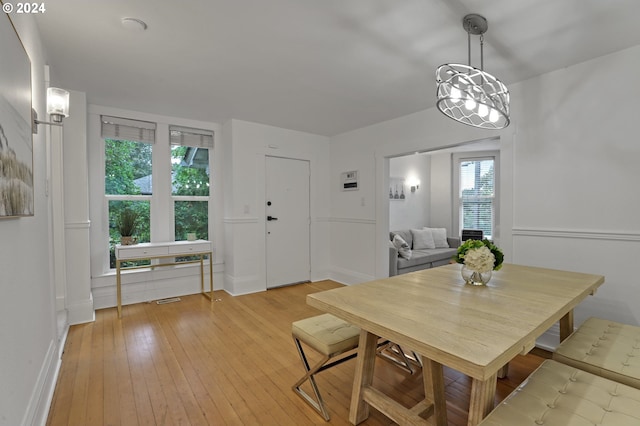 dining room with light hardwood / wood-style floors