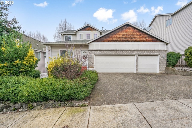 view of front of property with a garage