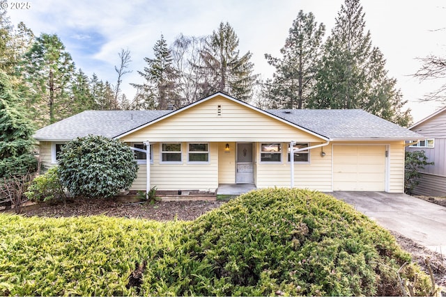 single story home featuring a garage