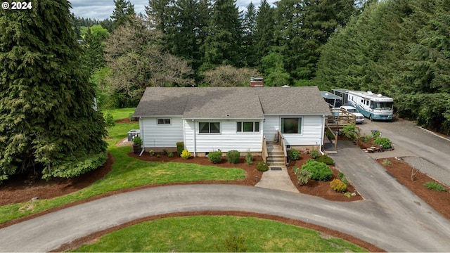 view of front of home with a front yard