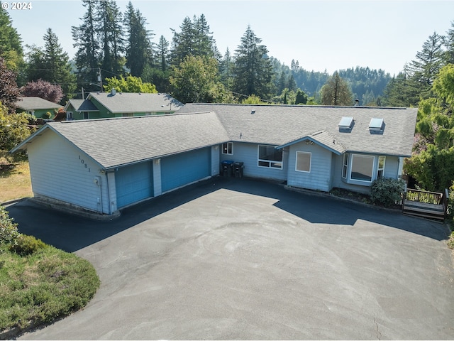 view of front of home with a garage