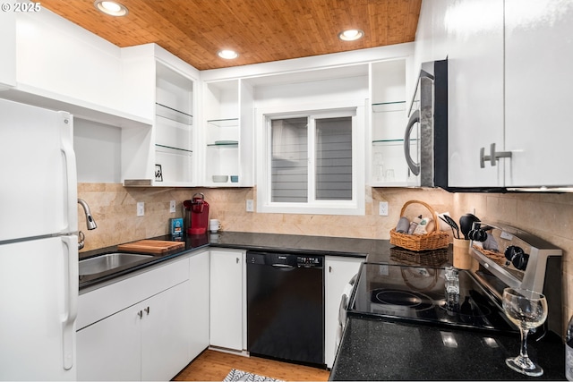 kitchen featuring freestanding refrigerator, black dishwasher, wood ceiling, electric stove, and dark countertops