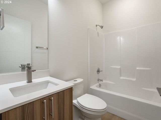 full bathroom with toilet, washtub / shower combination, and vanity