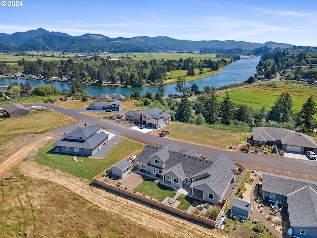 aerial view with a water and mountain view