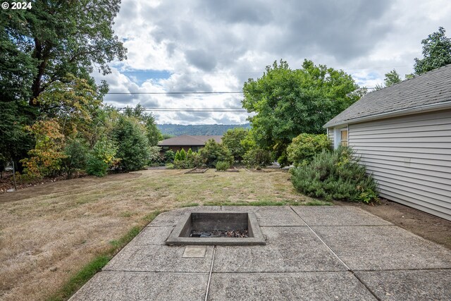 exterior space with an outdoor fire pit