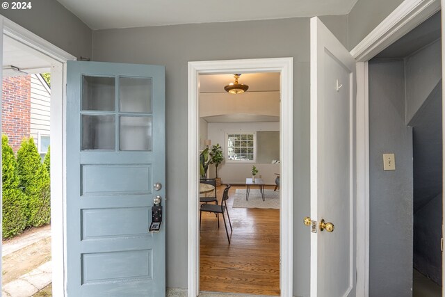 foyer entrance with hardwood / wood-style flooring