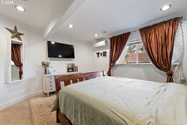 carpeted bedroom with a wall mounted air conditioner