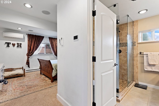 bathroom with tile patterned floors, a baseboard heating unit, a wall unit AC, and walk in shower