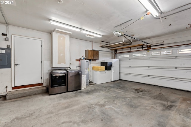 garage with a garage door opener, water heater, washer and dryer, and electric panel