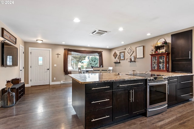 kitchen featuring a baseboard heating unit, a center island, stainless steel electric range, light stone counters, and dark hardwood / wood-style floors