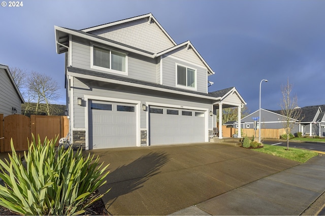 craftsman-style home featuring a garage