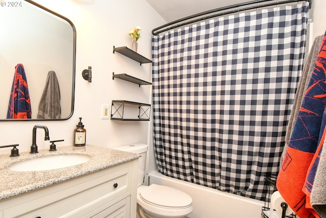 full bathroom with toilet, shower / tub combo with curtain, and vanity