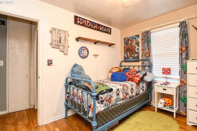 bedroom featuring hardwood / wood-style floors