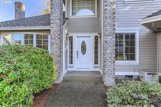 10420 SW 153rd Ave, Beaverton, OR 97007 - view of exterior entry with a chimney