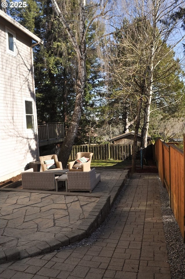 10420 SW 153rd Ave, Beaverton, OR 97007 - fenced backyard featuring a patio area and an outdoor hangout area