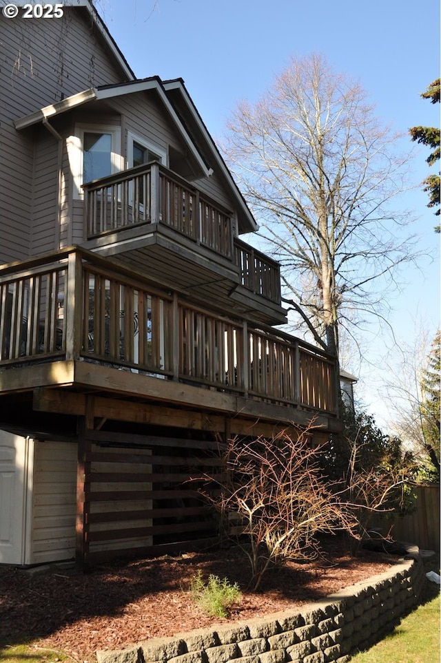 rear view of house with a balcony