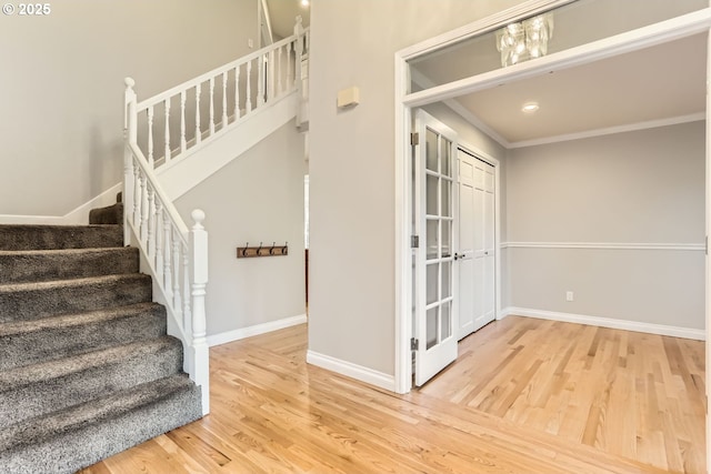 10420 SW 153rd Ave, Beaverton, OR 97007 - staircase featuring wood finished floors, baseboards, crown molding, and recessed lighting