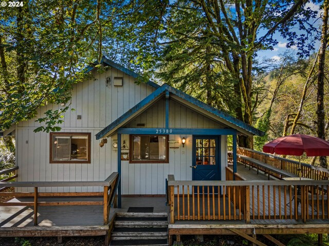 view of front of house with a deck