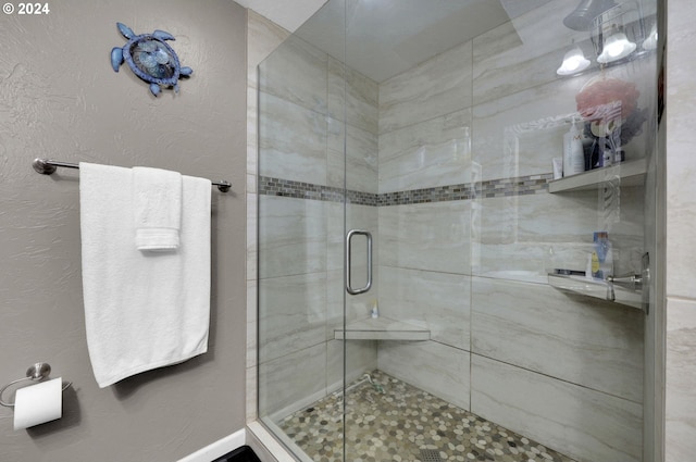 bathroom featuring walk in shower