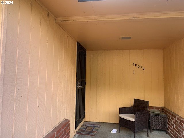 doorway to property with visible vents