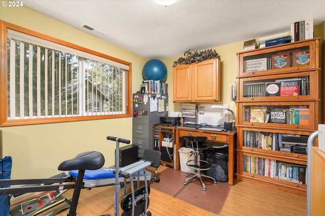 3824 Brighton Ave, Eugene, OR 97405 - home office with light wood finished floors and a textured ceiling