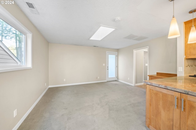 unfurnished living room with carpet