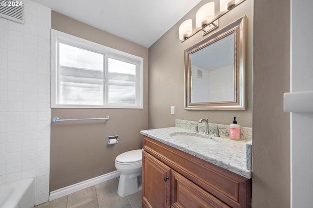 bathroom with tile patterned floors, vanity, and toilet