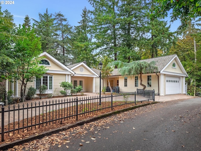 ranch-style home featuring a fenced front yard