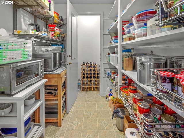 storage area featuring a toaster
