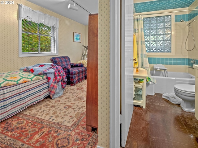 bedroom with wallpapered walls and tile patterned floors