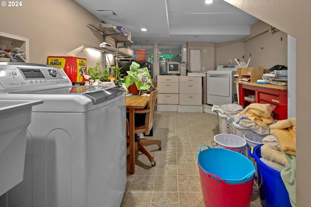 laundry area featuring washer and clothes dryer, recessed lighting, and laundry area