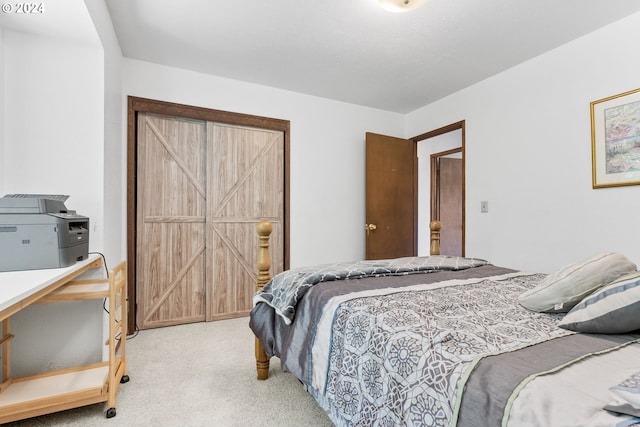 bedroom with light colored carpet