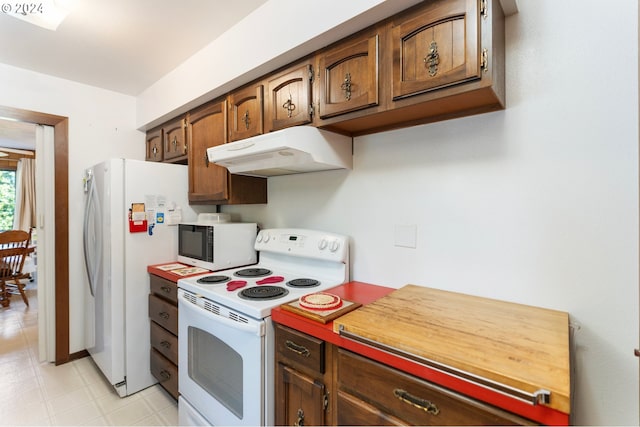 kitchen featuring white appliances