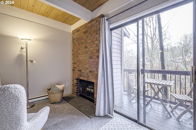 living room with lofted ceiling with beams, wooden ceiling, a fireplace, and a baseboard radiator