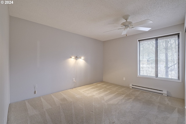 carpeted empty room with ceiling fan, a textured ceiling, and a baseboard heating unit