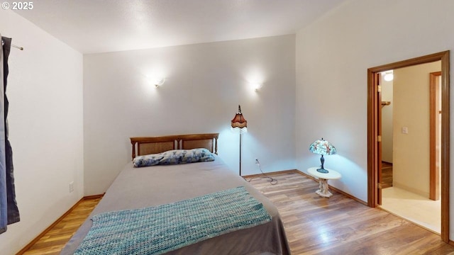 bedroom featuring light wood-type flooring