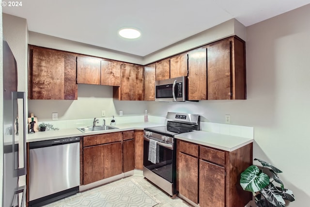 kitchen featuring stainless steel appliances and sink