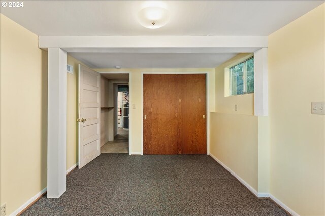 bedroom featuring light hardwood / wood-style floors, lofted ceiling, and a textured ceiling