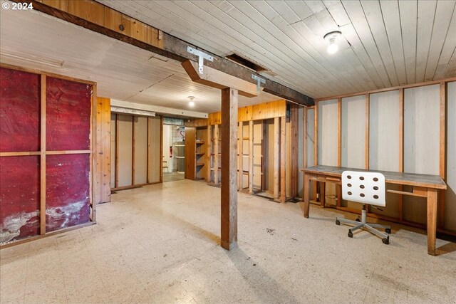 basement featuring wood ceiling