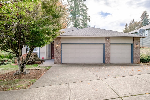 single story home with a garage