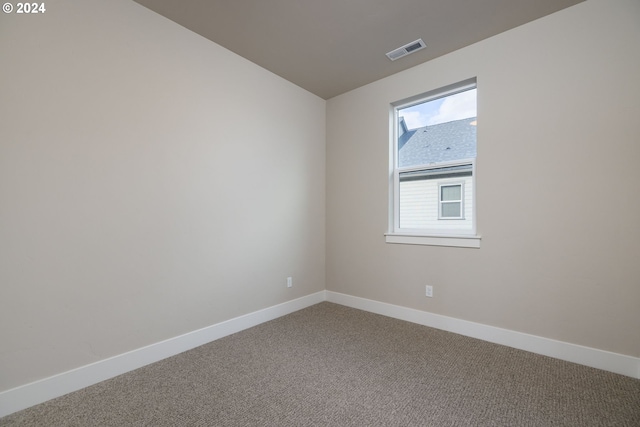 view of carpeted spare room