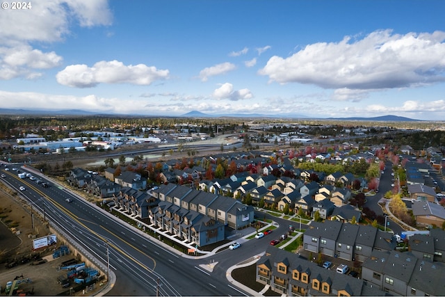 drone / aerial view featuring a mountain view