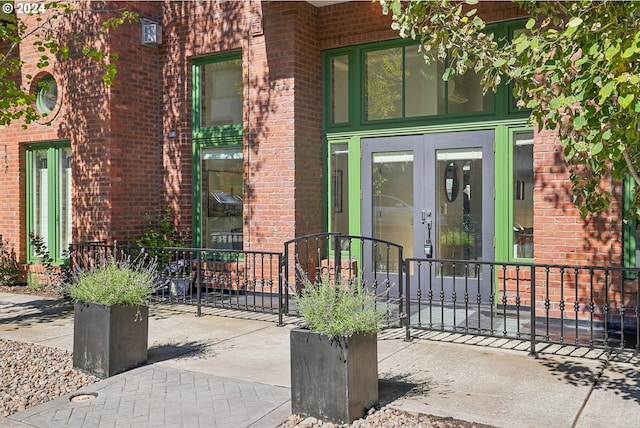 entrance to property featuring french doors