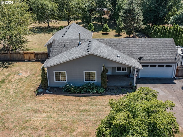 exterior space with a front lawn and a garage