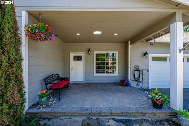 property entrance with a garage