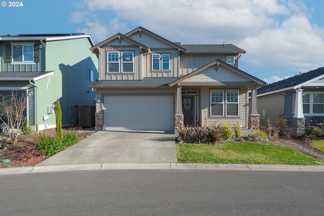 craftsman house featuring a garage