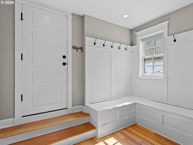 mudroom with light hardwood / wood-style flooring