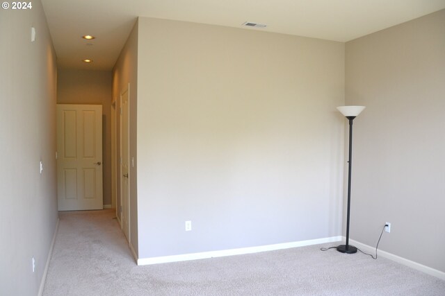 empty room with carpet flooring